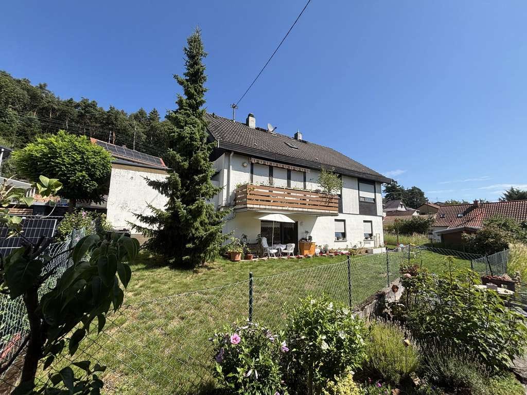 Immobilie in Dörrenbach - Gepflegtes MFH mit drei Wohnungen in sonniger Lage - Bild 3