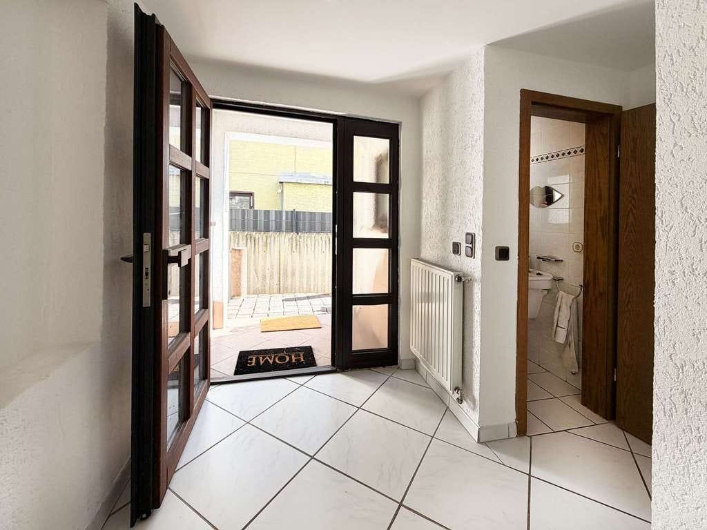 Immobilie in Bürstadt - Attraktive Erdgeschosswohnung mit Terrasse, Garten und viel Potenzial in ruhiger Lage von Bürstadt - Bild 3