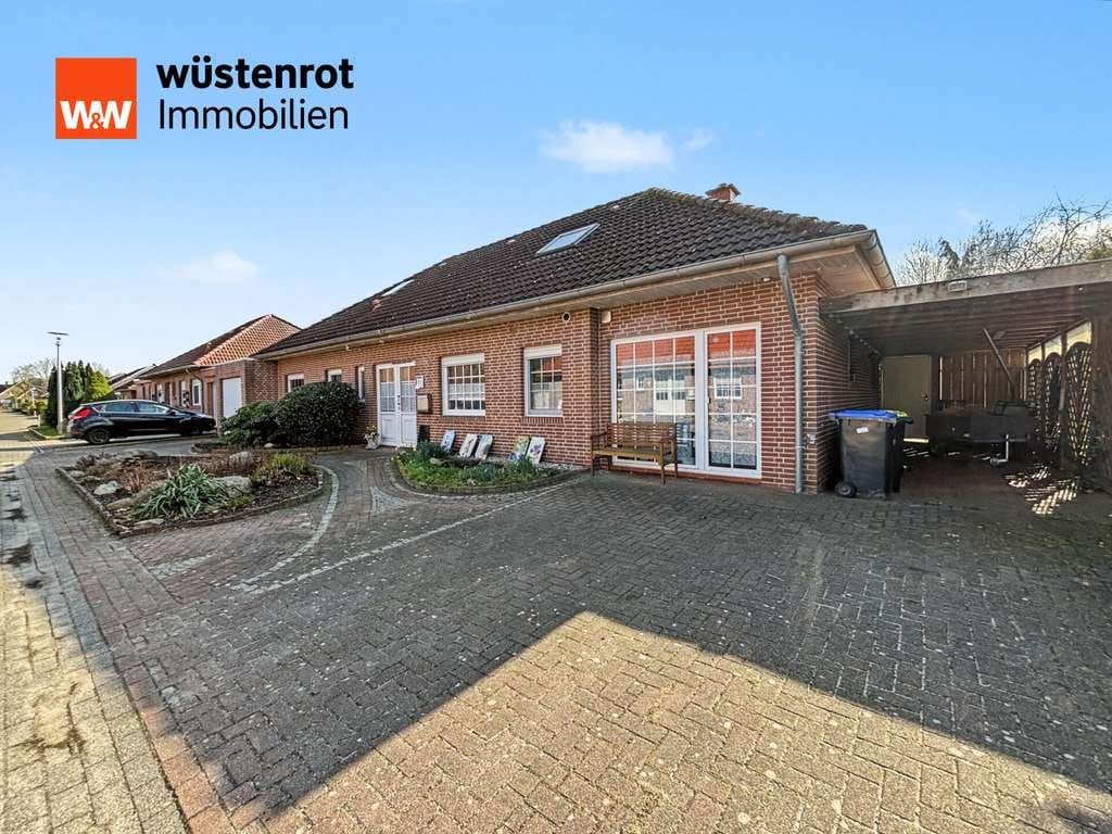 Immobilie in Neubörger - Ausgebauter Bungalow mit Wintergarten, Teich und Pool - Bild 0