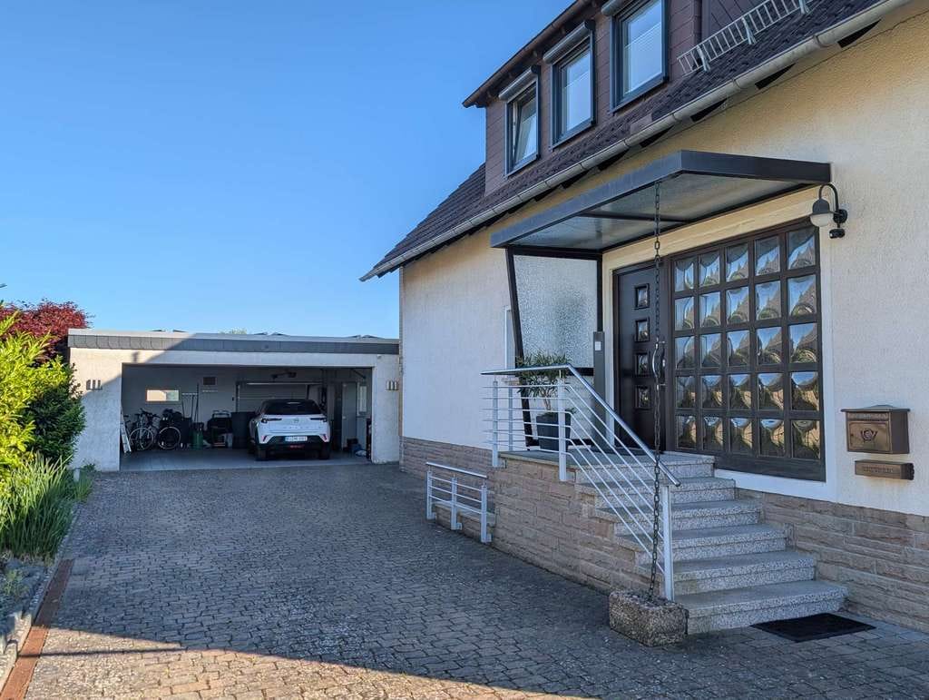 Immobilie in Hülsede - Wohnen mit Aussicht – Charmantes Zweifamilienhaus auf großzügigem Grundstück - Bild 4