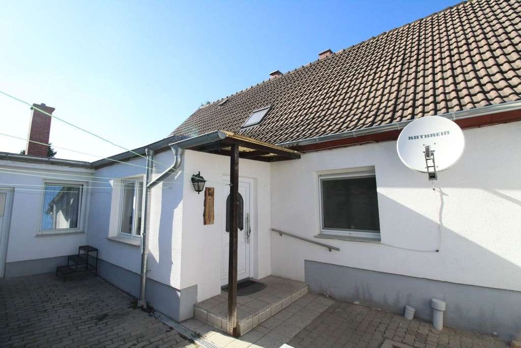 Immobilie in Goethestadt Bad Lauchstädt - Sofort verfügbar: 5-Zi.-EFH und separates Baugrundstück in Milzau - Bild 1