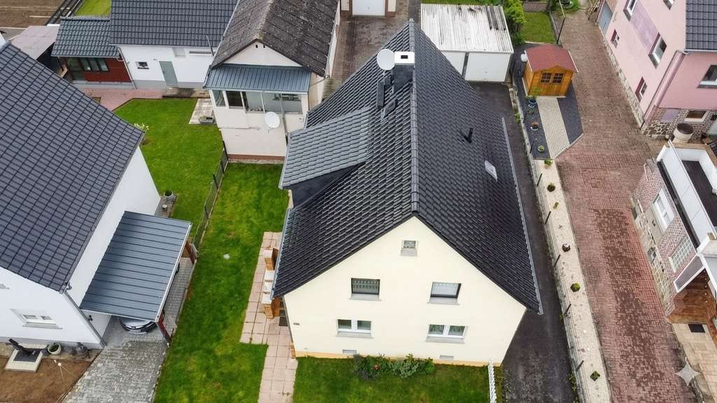 Immobilie in Schöffengrund - Modernes Familienidyll am Waldrand: Einziehen & Wohlfühlen in Schöffengrund-Laufdorf  - Bild 2