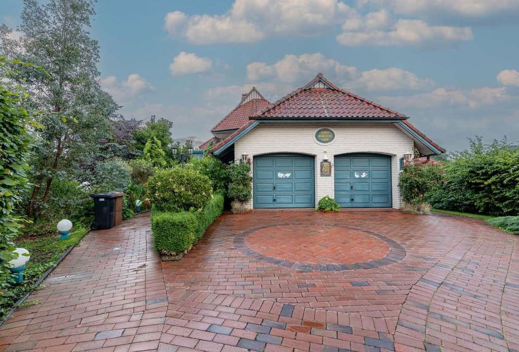 Immobilie in Krempe - Mehrfamilienhaus mit gepflegtem Garten - Bild 1