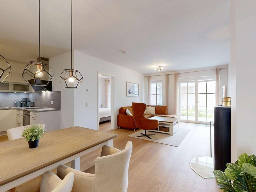 Immobilie in Wustrow - Modernes Ferienapartment im Erdgeschoss mit Süd-West Terrasse und Kamin - Bild 3