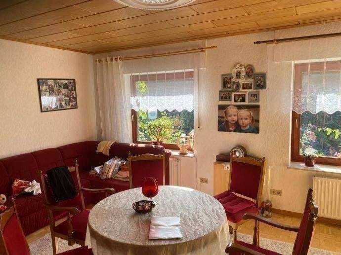 Immobilie in Bruchhausen-Vilsen - Charmantes Zweifamilienhaus in ruhiger Toplage – ideal zum Wohlfühlen und Investieren! - Bild 1
