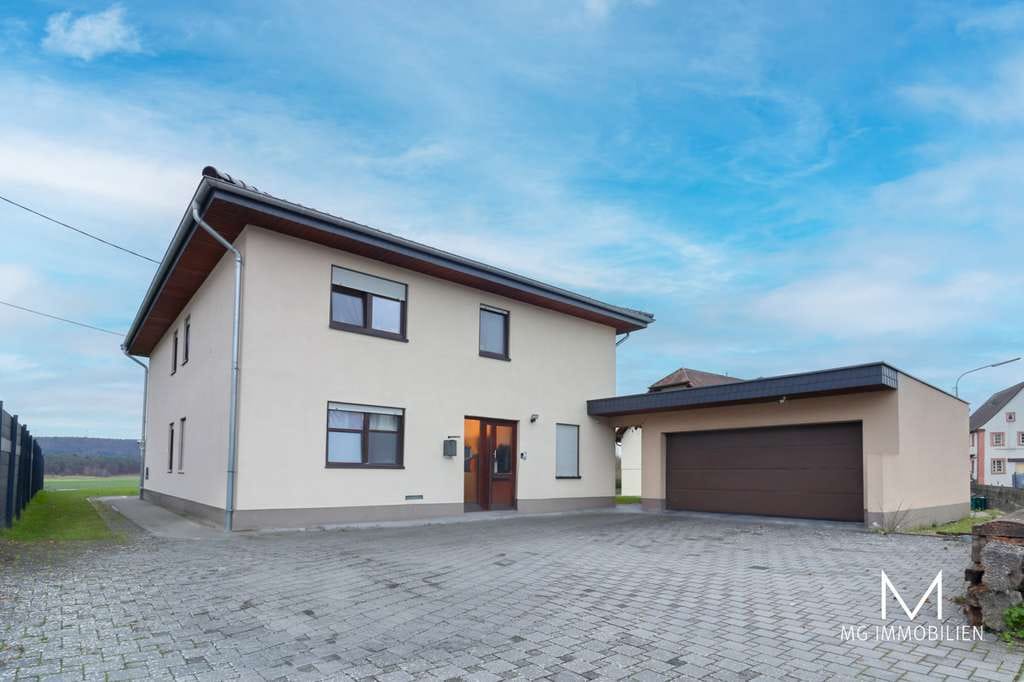 Immobilie in Hütschenhausen - MG - Vermietetes Einfamilienhaus mit Garten und Garage in Spesbach - Bild 0