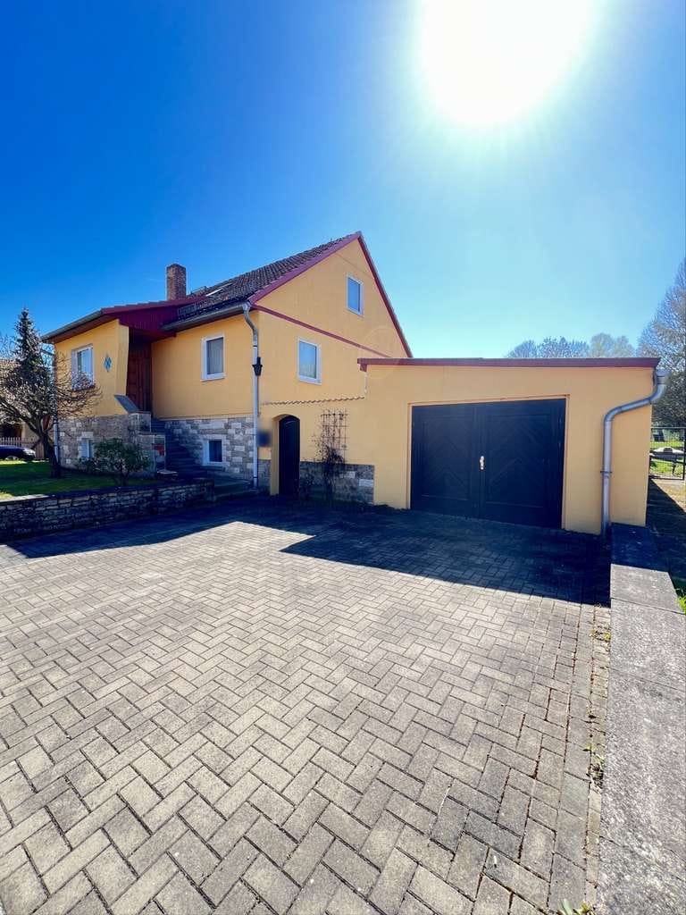 Immobilie in Nottertal-Heilinger Höhen - Einfamilienhaus in Obermehler mit großem Garten, Garage und Nebengelass - Bild 1