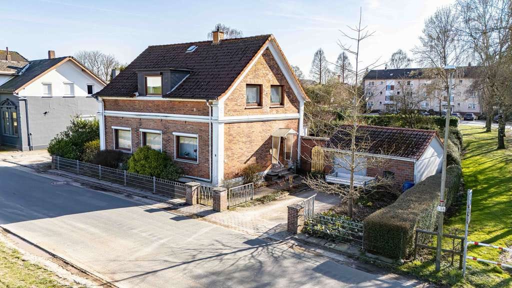 Immobilie in Lemwerder - Flexibles Mehrgenerationenhaus mit weitläufigem Garten und Garage - Bild 0