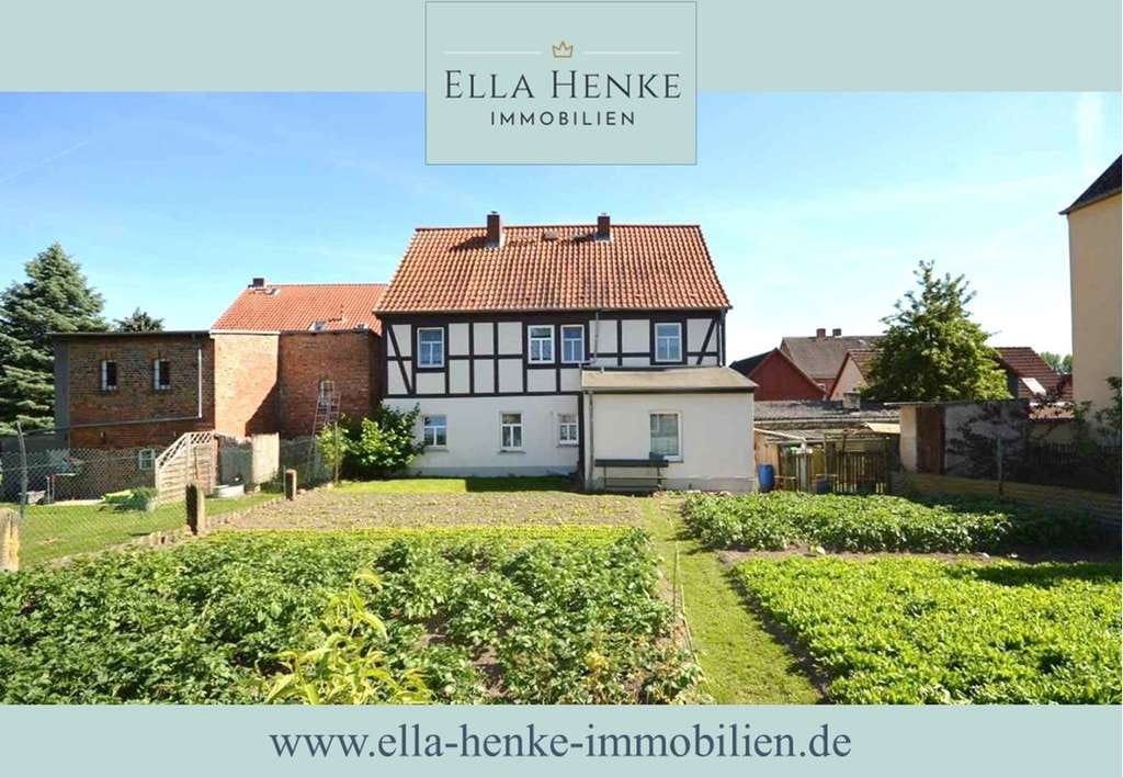 Immobilie in Eilsleben - Historisches Fachwerkhaus mit 3 vermieteten Wohnungen und großem Garten. - Bild 0