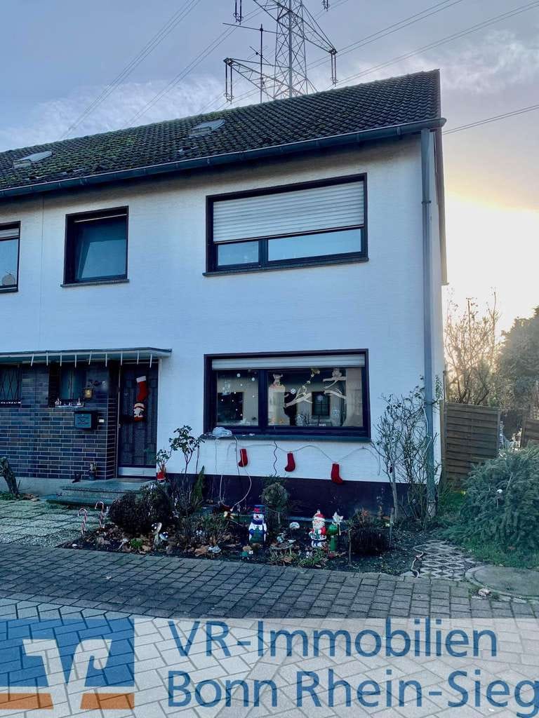 Immobilie in Niederkassel - Vermietete Doppelhaushälfte mit Sanierungsbedarf im schönen Rheidt ! - Bild 1