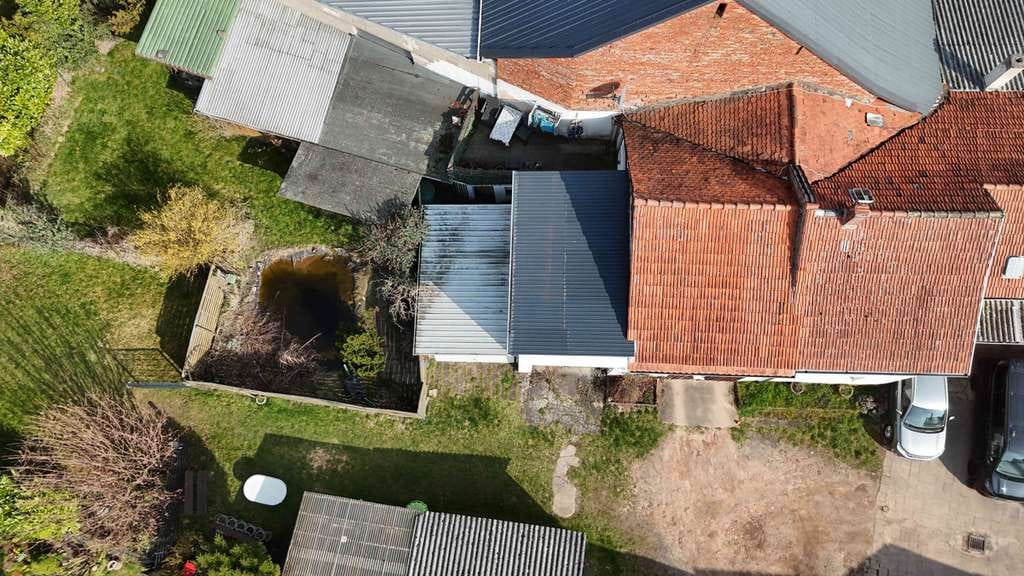 Immobilie in Hasselroth - MFH mit 2 Wohnungen + 2 Gewerbeeinheiten - 307 m² Fläche & Entwicklungspotenzial - Bild 2