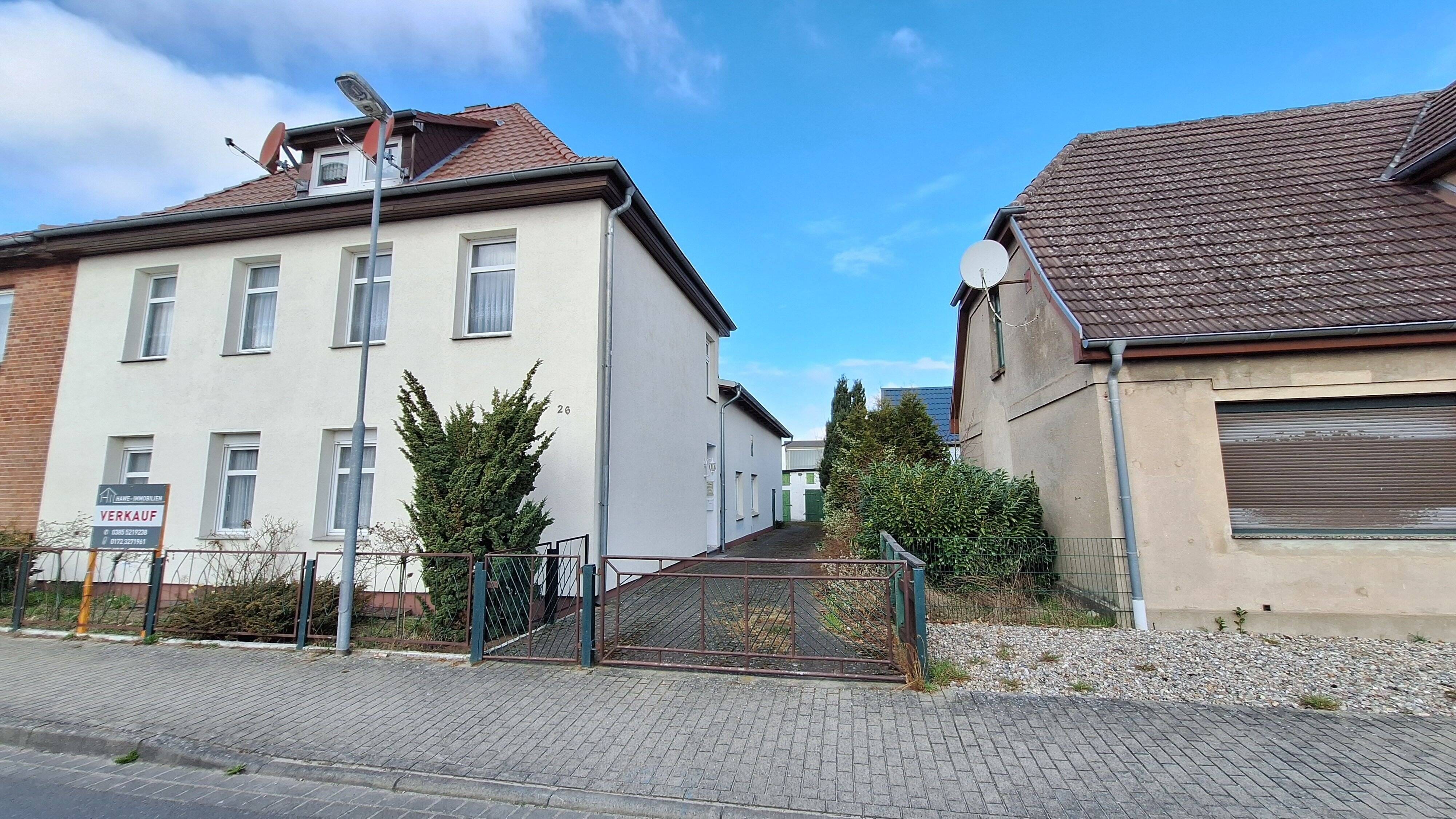 Immobilie in Neustadt-Glewe - Einfamilienhaus mit Einliegerwohnung in 19306 Neustadt-Glewe - Metropolregion Hamburg - Bild 1