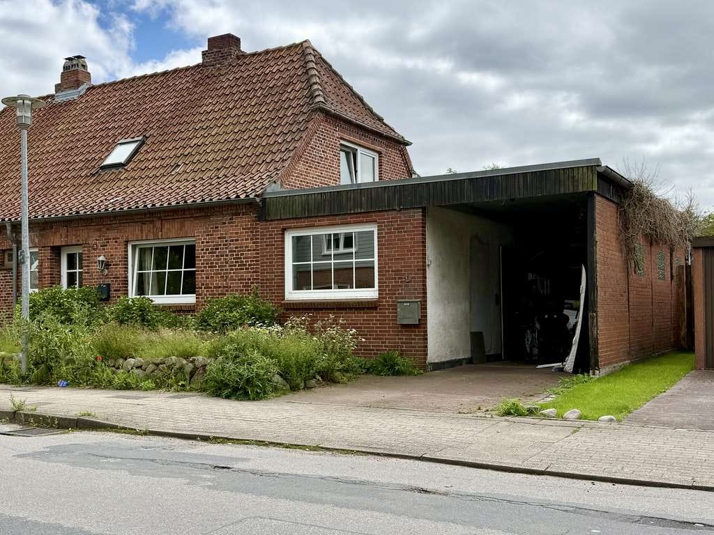 Immobilie in Niebüll - Doppelhaushälfte mit Südgarten - Bild 1