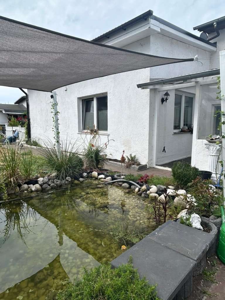 Immobilie in Ückeritz - CHARMANTES WOHNHAUS MIT BLICK AUF DAS ACHTERWASSER IN ÜCKERITZ. - Bild 3