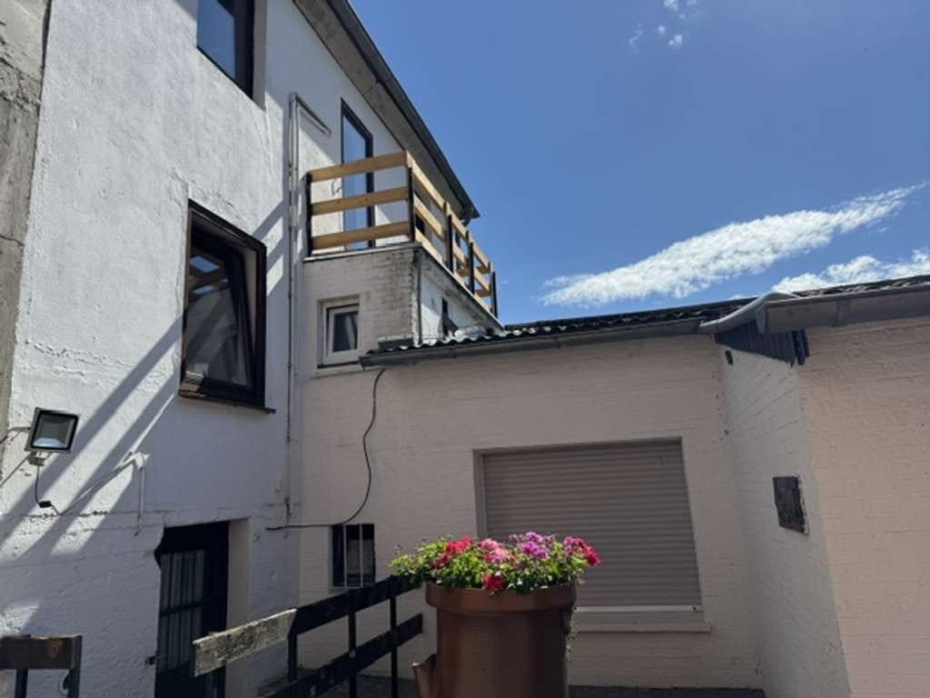 Immobilie in Geilenkirchen - Zweifamilienensemble mit Vorder- und Hinterhaus, Garage, Stellplätzen und idyllischem Garten! - Bild 4