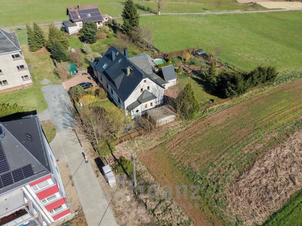 Immobilie in Oelsnitz/Erzgeb. - Doppelhaushälfte in Oelsnitz/Erzgeb. kaufen: 124 m² Wohnfläche, schöner Garten, Garage und Keller - Bild 5