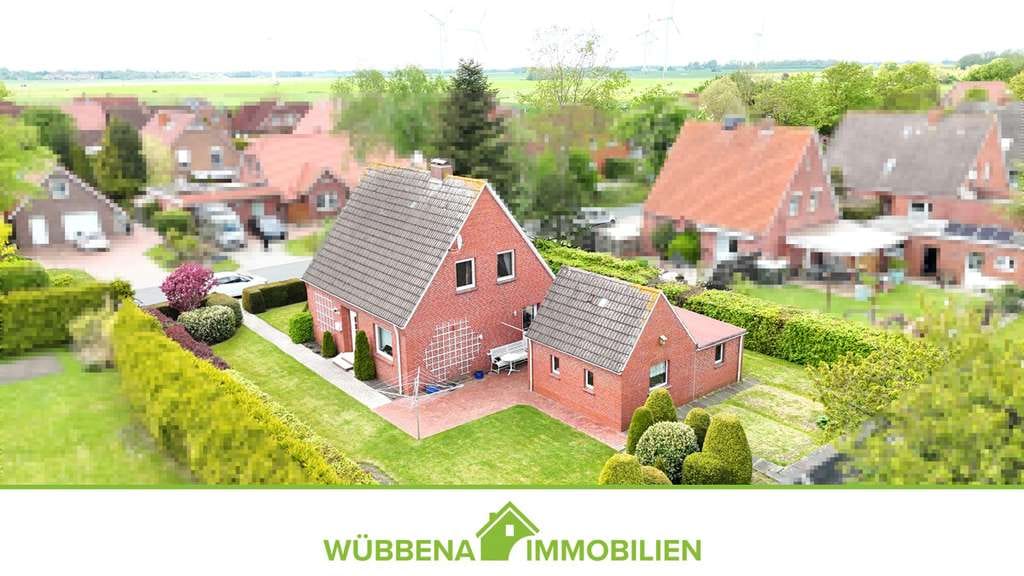 Immobilie in Hinte - Hinte! Einfamilienhaus mit Garage und Garten in familienfreundlicher Wohnlage und Nähe zur Krummhörn - Bild 0