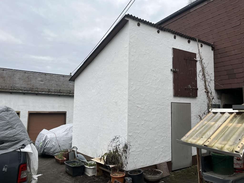 Immobilie in Hümmerich - Vermietetes Reihenmittelhaus mit kleinem Nebengebäude in Hümmerich! - Bild 2
