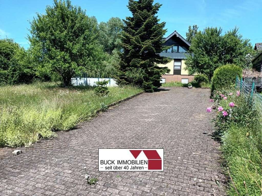 Immobilie in Hellenhahn-Schellenberg - Platz für die große Familie!  Gepflegtes Wohnhaus mit ELW in idyllischer Ortsrandlage - Bild 3
