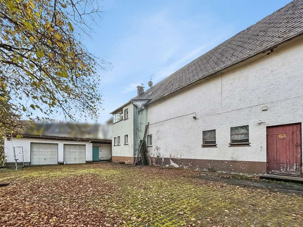 Immobilie in Rötsweiler-Nockenthal - Rötsweiler-Nockenthal: Bauernhaus und zusätzliches Wohnhaus – vielseitiges Sanierungsobjekt  - Bild 1