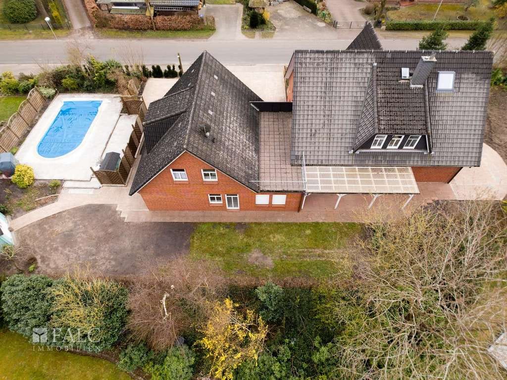 Immobilie in Oldendorf - Top gepflegtes Einfamilienhaus mit Einliegerwohnung und Praxis in schöner Lage von Oldendorf - Bild 4