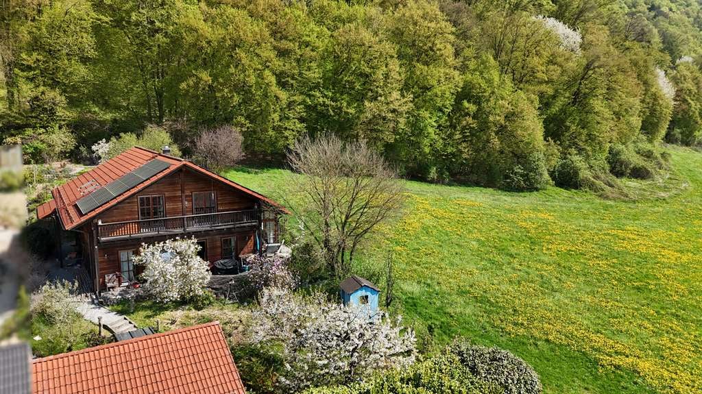Immobilie in Haiming - Wohnen im Einklang mit der Natur – Traumhaftes Holzhaus mit Alpenblick - Bild 1