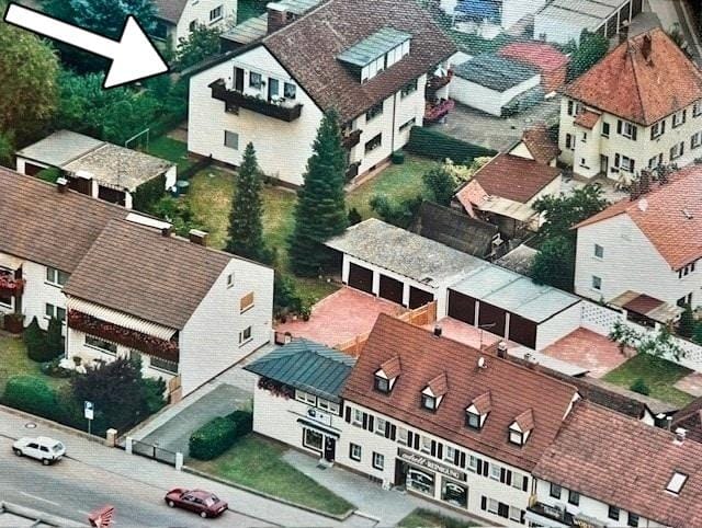 Immobilie in Schwarzenbruck - Solide Dachgeschosswohnung mit Balkon, Garage & Entwicklungspotenzial in Ochenbruck! - Bild 0