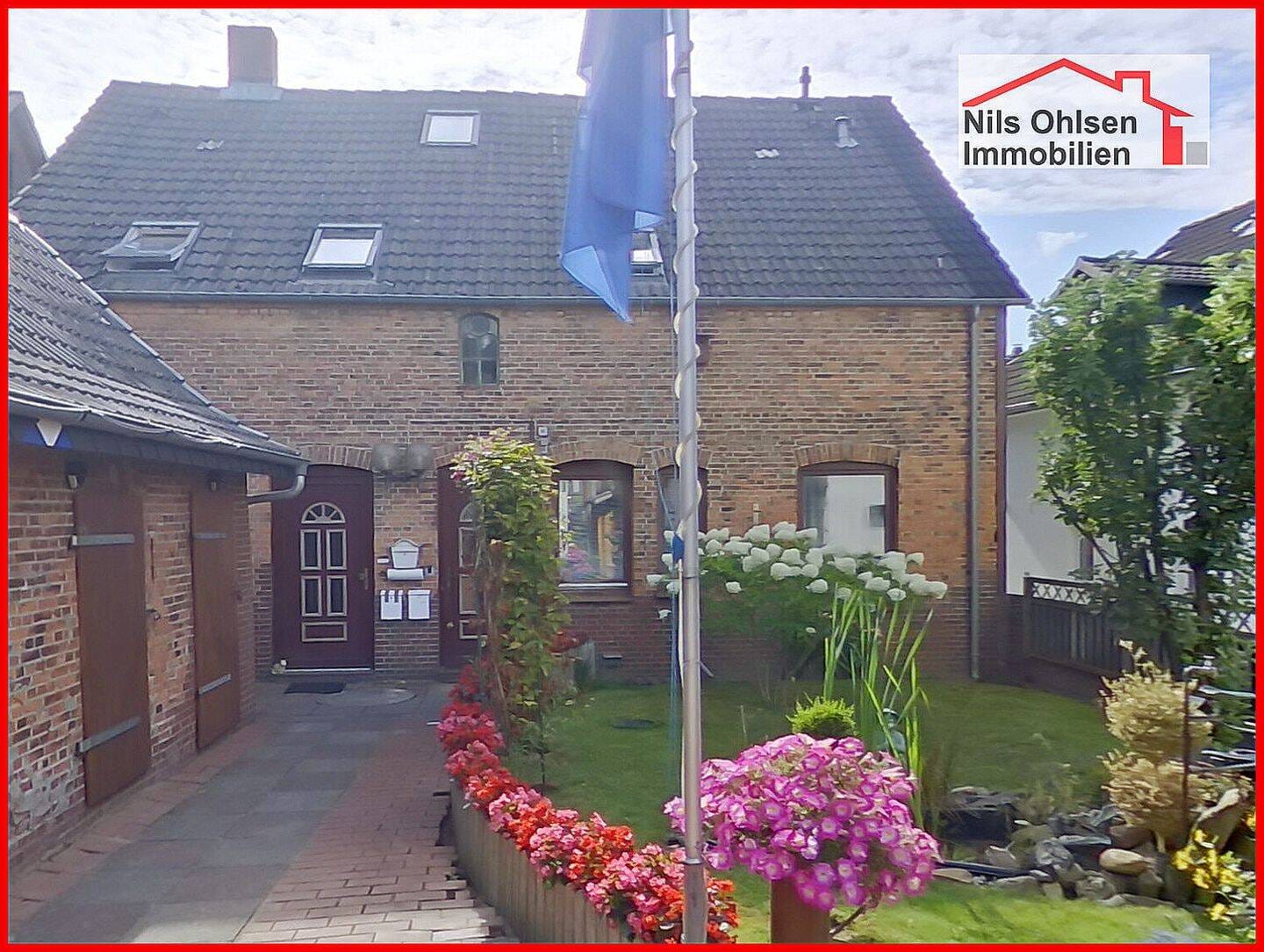 Immobilie in Itzehoe - Charmanter Bakstein-Klassiker mit Vielfalt - 3 Wohneinheiten & idyllischer Gartenbereich - Bild 3