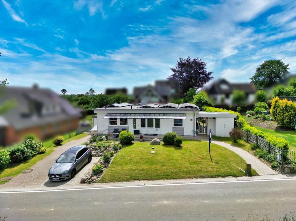 Immobilie in Steinbergkirche - Nur wenige Schritte zum Meer: Bungalow mit Garten, Wintergarten, PV, Terrasse & befrist. Wohnrecht. - Bild 0