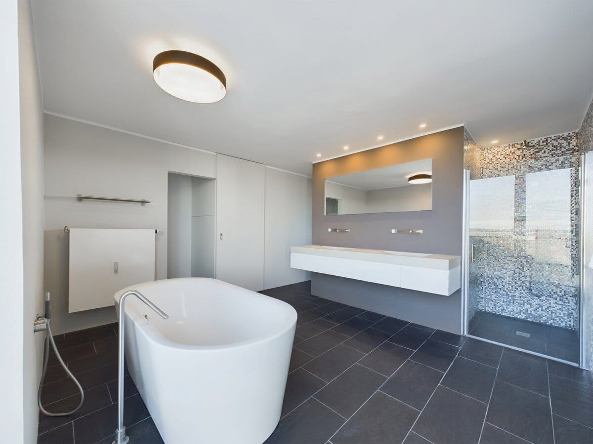 Immobilie in Putzbrunn - DAS PENTHOUSE:  einzigartiges, lichtdurchflutetes, loftartiges Wohnkonzept mit Bergblick - Bild 4