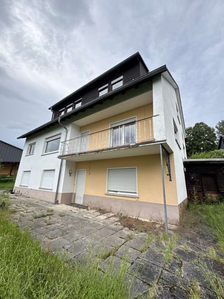 Immobilie in Dietzhölztal - Freistehendes Wohnhaus mit vielseitigen Nutzungsmöglichkeiten und traumhaftem Ausblick - Bild 0