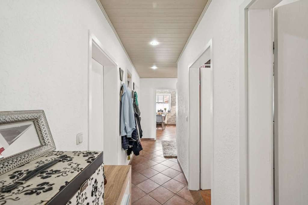 Immobilie in Schülp bei Rendsburg - Mit viel Herz gepflegt – gemütlicher Bungalow mit Wintergarten & Garten - Bild 3