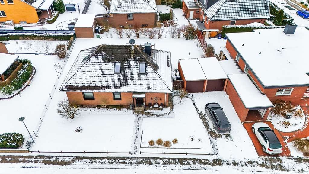 Immobilie in Bad Bodenteich - Modernisierter Familien-Bungalow mit zwei Garagen & großem Grundstück - Bild 1