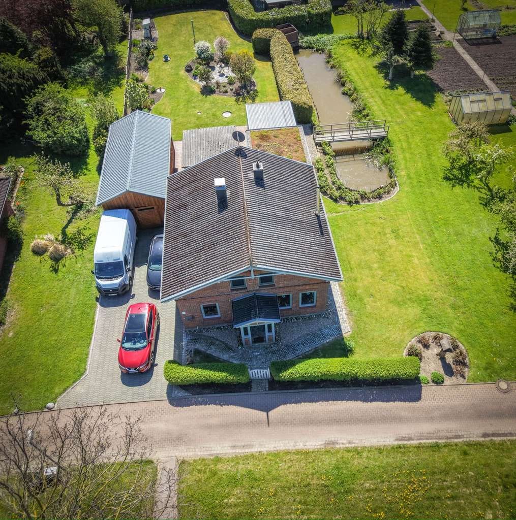 Immobilie in Herzhorn - Einfamilienhaus am Deich mit großem Garten, Garage & Klimaanlage – Herzhorn  - Bild 2