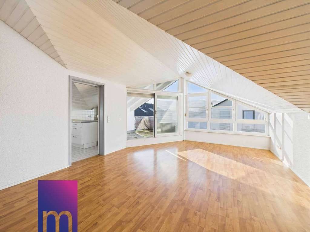 Immobilie in Deizisau - Lichtverwöhnte, offen gestaltete Dachgeschosswohnung mit Süd-Balkon - Bild 2