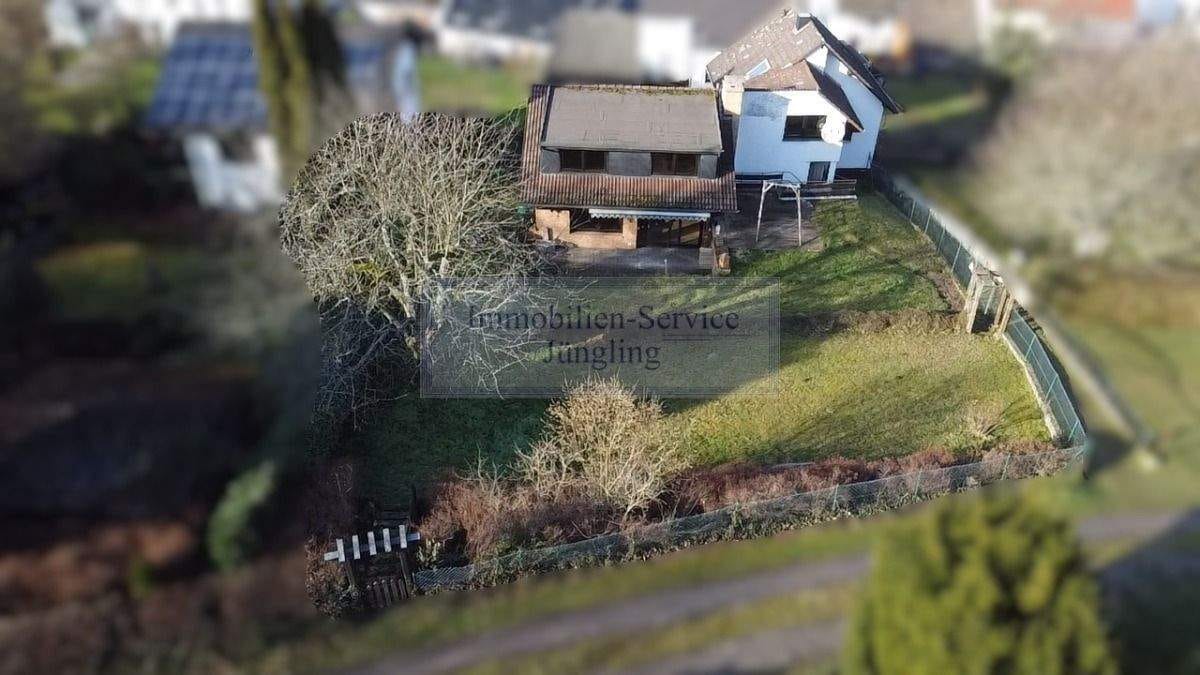 Immobilie in Hönningen - Zweifamilienhaus in Hönningen zu verkaufen. - Bild 1
