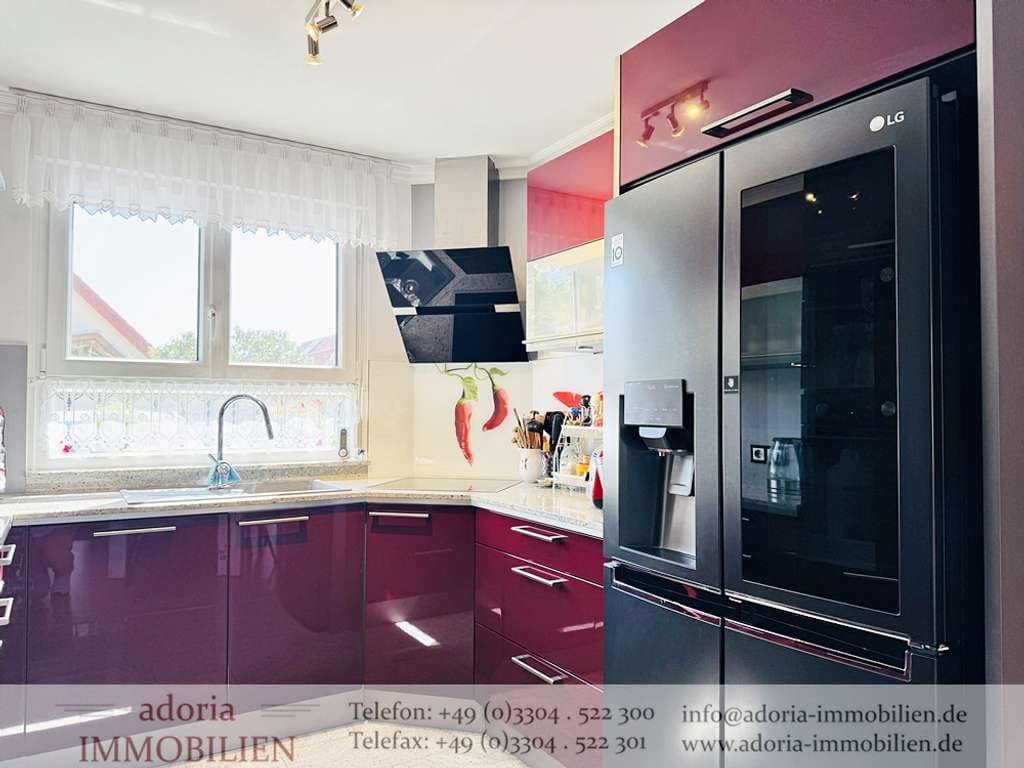 Immobilie in Oberkrämer - Sehr gepflegtes Reihenmittelhaus mit Wintergarten und Ausblick aufs Feld in beliebter Wohnsiedlung - Bild 4