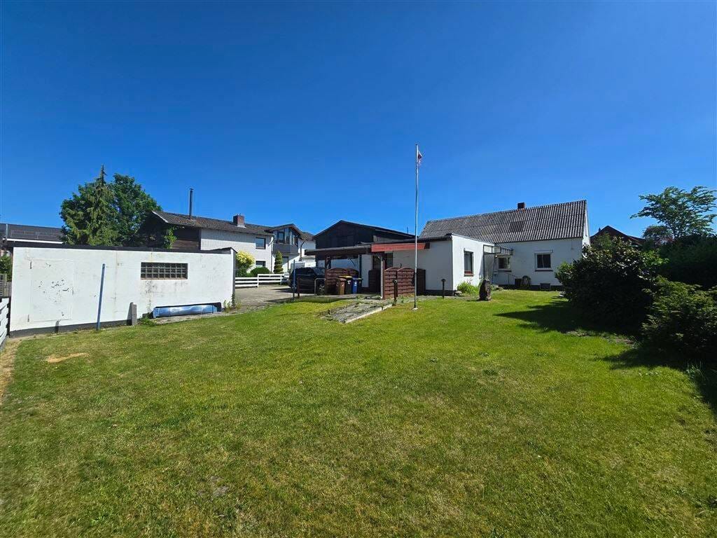 Immobilie in Groß Nordende - EFH Nähe Uetersen mit rund 148m² Wohn- und Nutzfläche zzgl. Doppelgarage - Bild 0