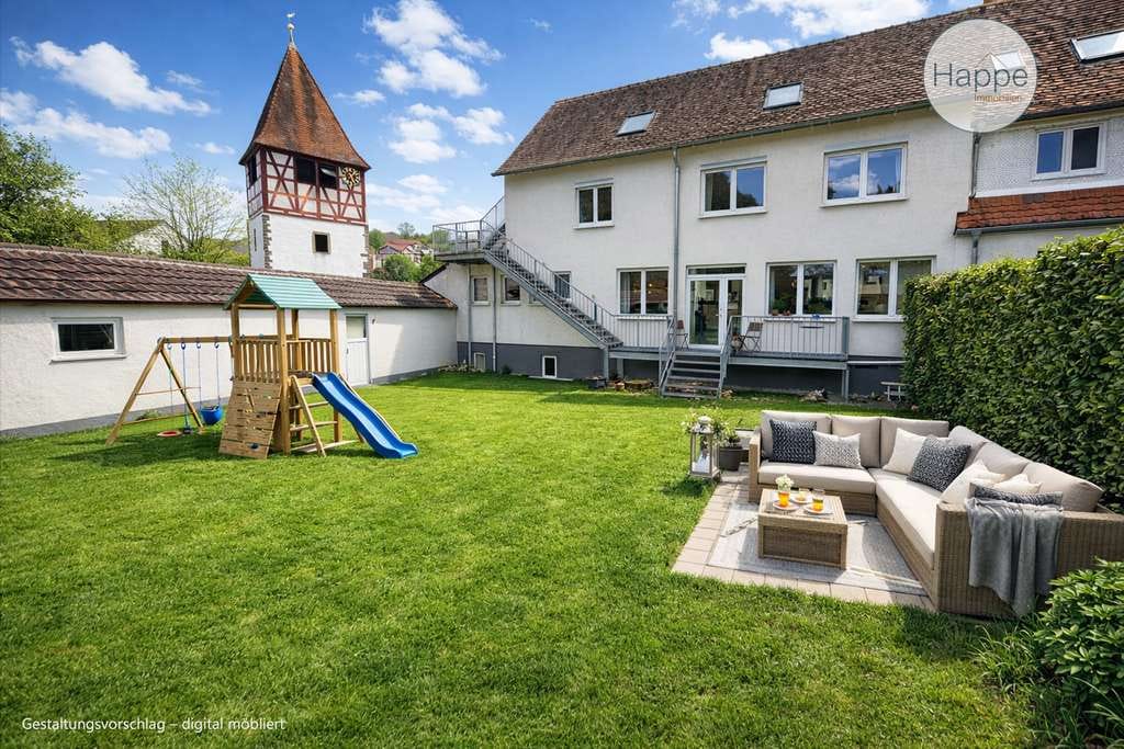 Immobilie in Weißbach - Hausgefühl statt Standard: großzügige EG-Wohnung mit Charakter & Garten - Bild 1