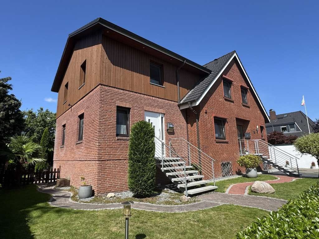 Immobilie in Hollern-Twielenfleth - Zweifamilienhaus mit grüner Oase in ruhiger Lage - Bild 1