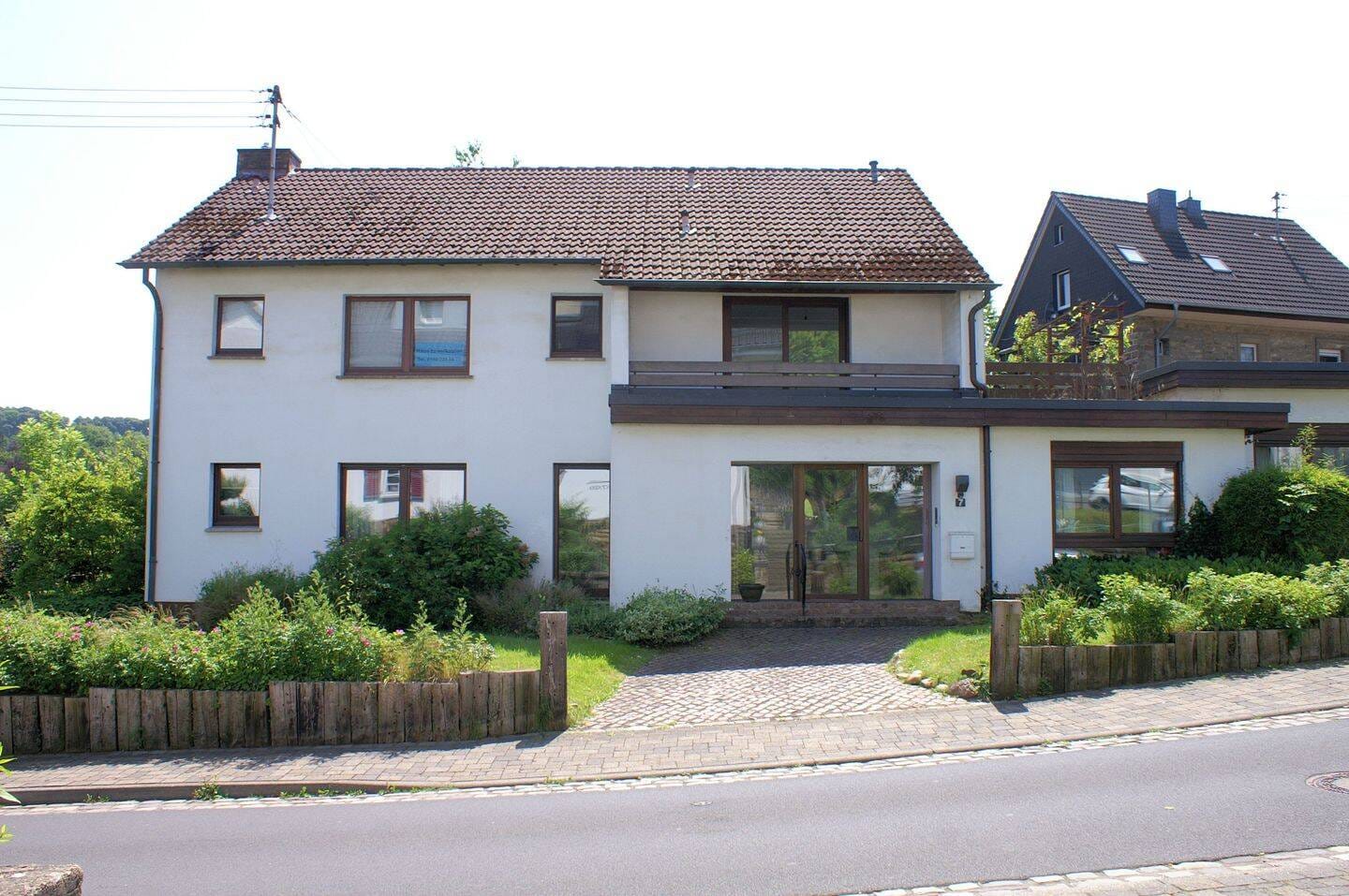 Immobilie in Ruppichteroth - Einfamilienhaus mit Einliegerwohnung in zentraler Lage von Ruppichteroth - Bild 0