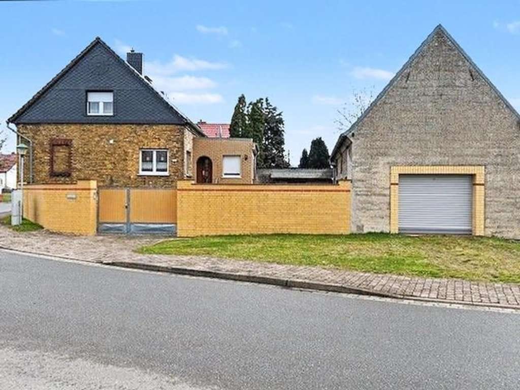 Immobilie in Kemberg - Einziehen und wohlfühlen - Einfamilienhaus mit pflegeleichtem Grundstück in Kemberg-OT - Bild 1