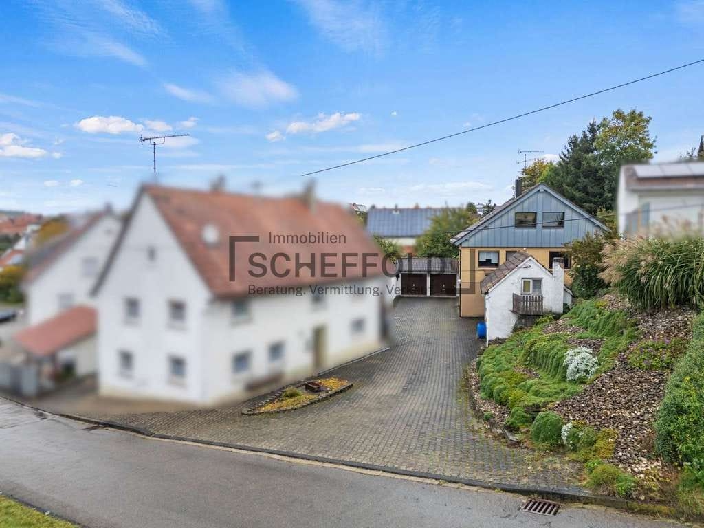 Immobilie in Schwendi - Familienfreundlich! Vielseitiges Einfamilienhaus mit modernisierter Küche und eigener Gartenidylle - Bild 2