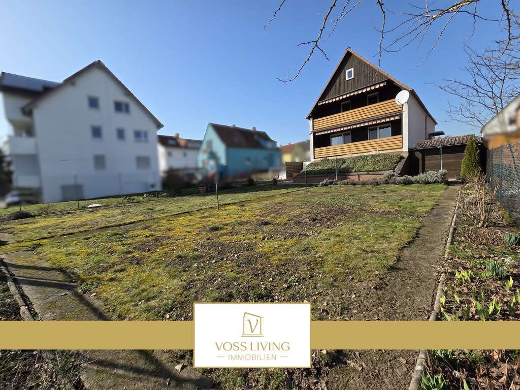 Immobilie in Wöllstadt - Ein-| Zweifamilienhaus mit 2 Balkonen, Garten, Keller, Garage und 2 KFZ Stellplätzen in Feldrandlage - Bild 0