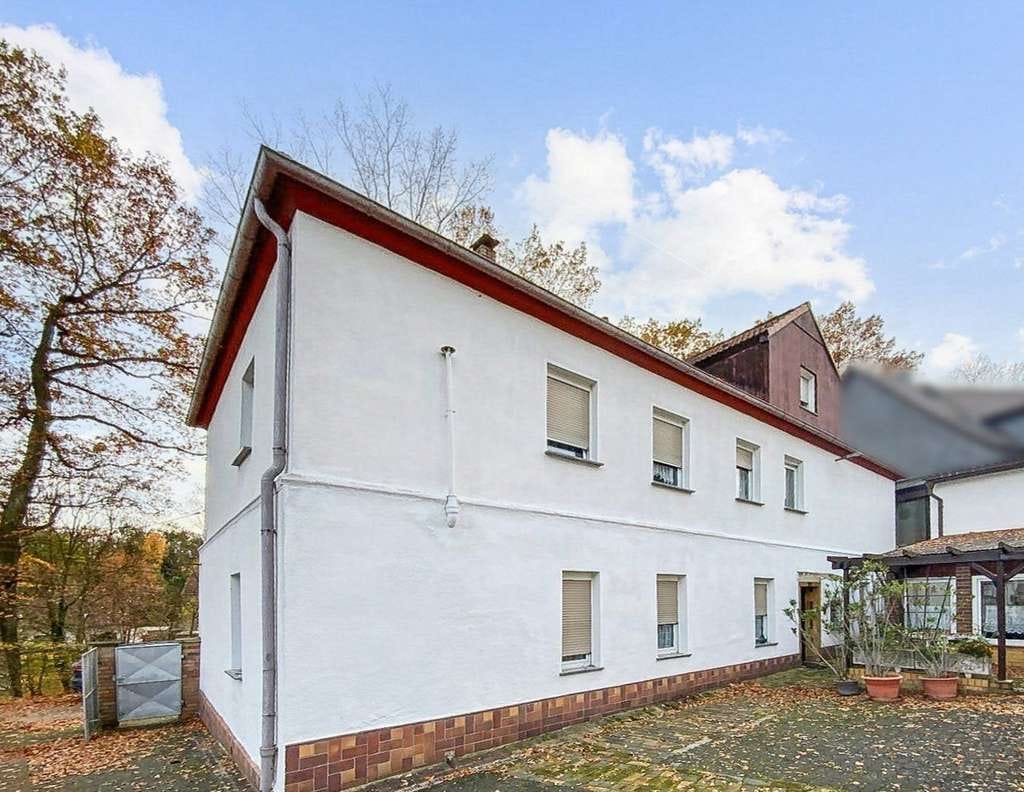 Immobilie in Lauchhammer - Zweifamilienhaus mit vielseitig nutzbarem Grundstück in Lauchhammer - Bild 1