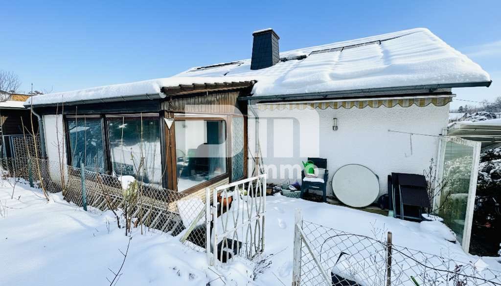 Immobilie in Ahnatal - Umfangreich saniertes EFH inkl. PV-Anlage, Terrasse, Wintergarten und Garage + Panoramablick - Bild 2