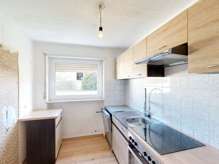 Immobilie in Freinsheim - Gut geschnittene 3-Zimmer-Wohnung in Stadtmauernähe – ideale Basis für individuelle Gestaltung - Bild 2
