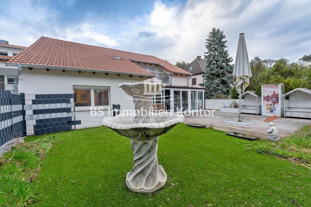 Immobilie in Dörrenbach - Dörrenbach! Großzügige EG-Wohnung mit Wintergarten, Garage, Garten und Terrasse in ruhiger Wohnlage! - Bild 1