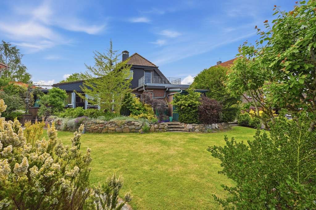 Immobilie in Göhl - Attraktives Einfamilienhaus mit Wintergarten und sonnigem Grundstück auf der Ost- und Westseite - Bild 1
