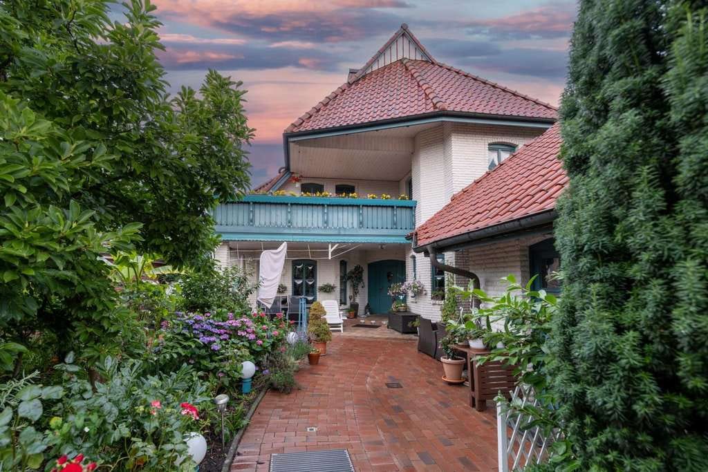 Immobilie in Krempe - Mehrfamilienhaus mit gepflegtem Garten - Bild 0